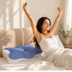 Woman waking up refreshed after sleeping on the Oasisleep Solace Pillow